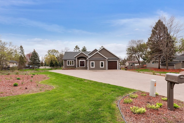 view of front of home featuring a garage, fence, a front yard, and concrete driveway