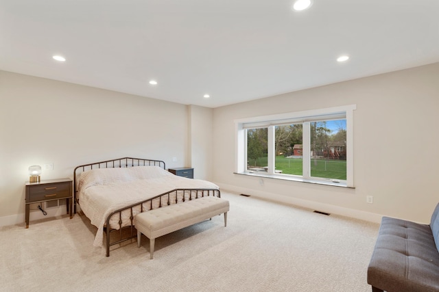 bedroom with recessed lighting, baseboards, visible vents, and light carpet