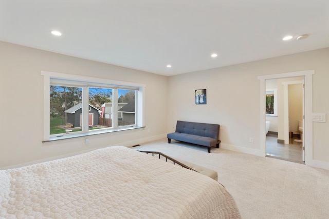 carpeted bedroom featuring recessed lighting, baseboards, and visible vents