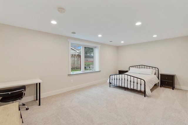 carpeted bedroom with baseboards and recessed lighting