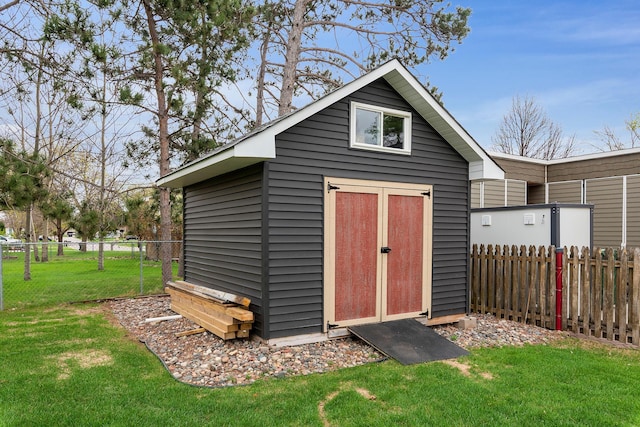 view of shed featuring fence private yard