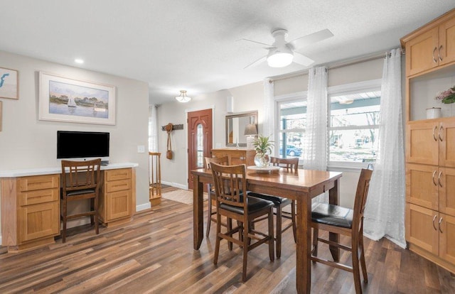 956 10th Ave SE, Forest Lake, MN 55025 - dining area featuring dark wood finished floors, ceiling fan, a desk, recessed lighting, and baseboards