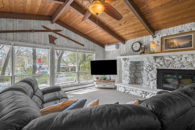 956 10th Ave SE, Forest Lake, MN 55025 - carpeted living area featuring a ceiling fan, wooden ceiling, a baseboard radiator, a stone fireplace, and a wall unit AC