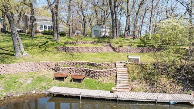 956 10th Ave SE, Forest Lake, MN 55025 - dock featuring stairs, a water view, and a lawn