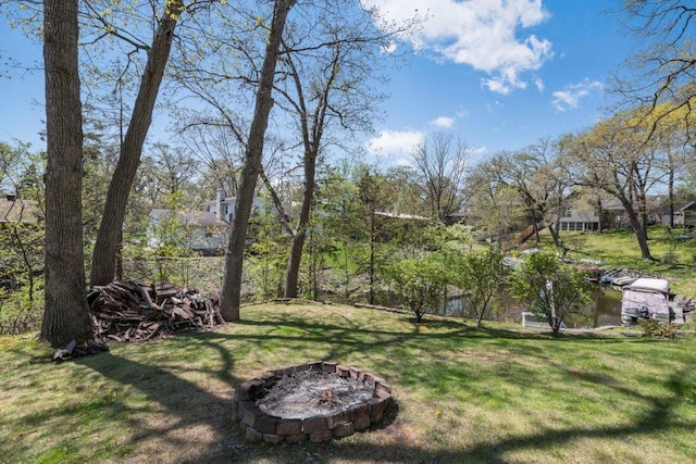 956 10th Ave SE, Forest Lake, MN 55025 - view of grassy yard featuring an outdoor fire pit