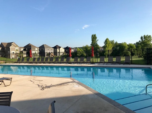 14879 50th St NE, Saint Michael, MN 55376 - community pool featuring a residential view, fence, and a patio