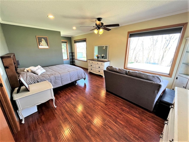 bedroom featuring ornamental molding, wood finished floors, a textured ceiling, a ceiling fan, and recessed lighting