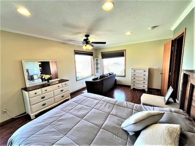 bedroom featuring ornamental molding, a textured ceiling, dark wood-type flooring, baseboards, and ceiling fan