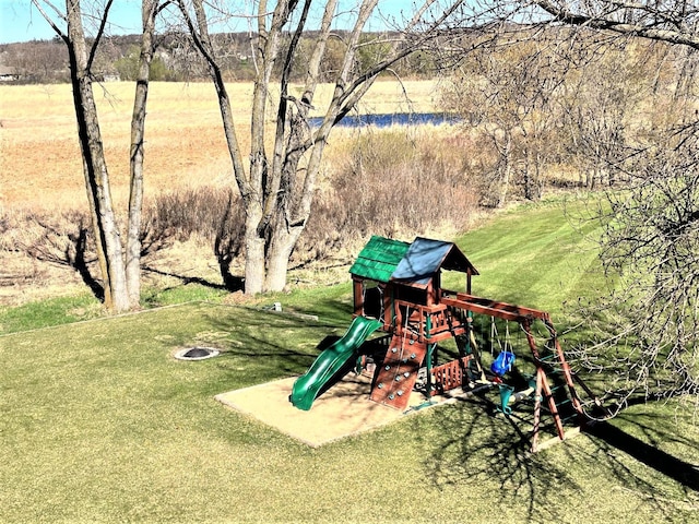 view of playground featuring a yard