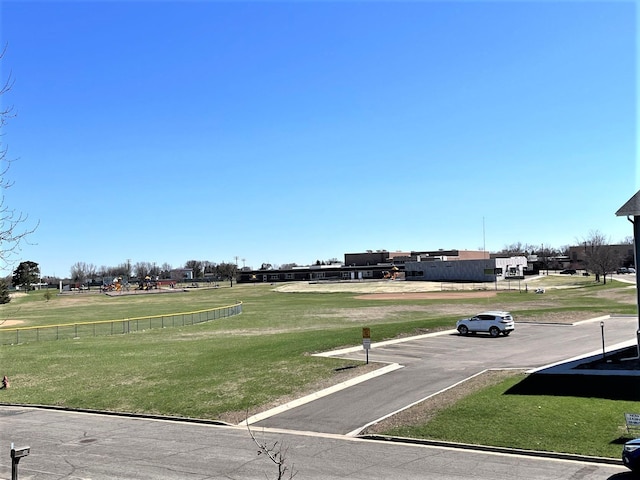 surrounding community featuring a yard