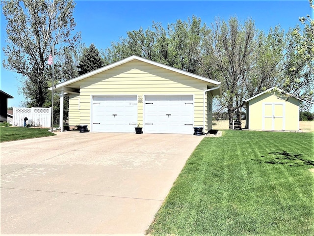 detached garage with a shed