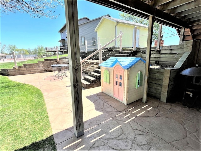 view of patio / terrace with stairway
