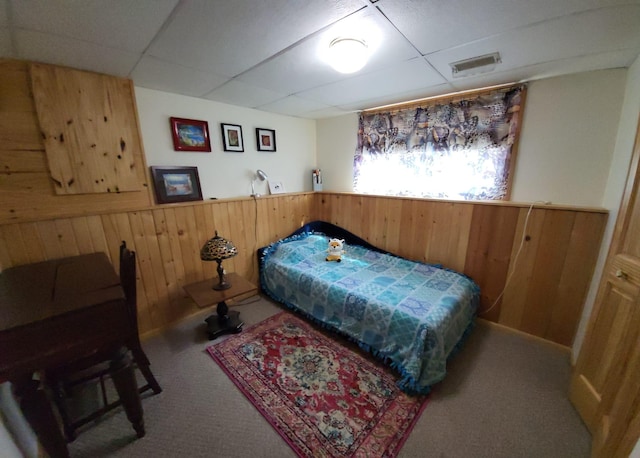 5344 Shady Ln, Canosia Twp, MN 55811 - carpeted bedroom with a wainscoted wall, a drop ceiling, visible vents, and wooden walls