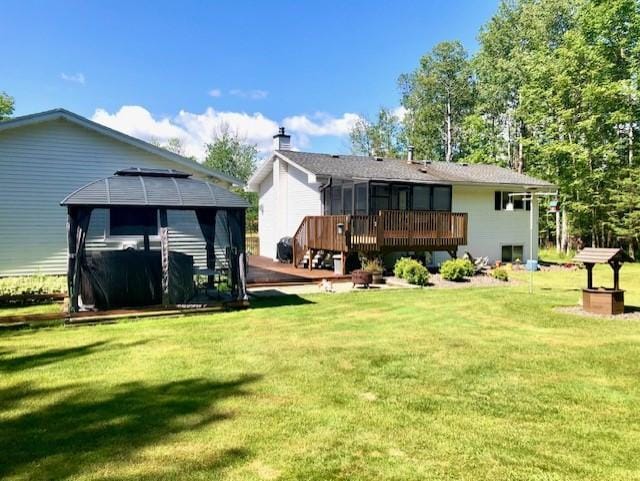 5344 Shady Ln, Canosia Twp, MN 55811 - rear view of property with a lawn, a gazebo, and a wooden deck