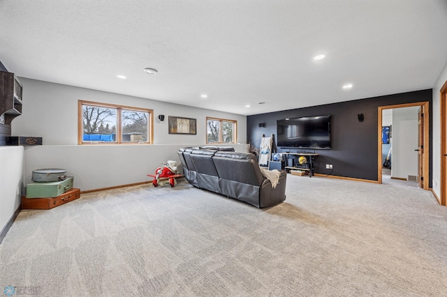 134 Newport Pkwy N, Kindred, ND 58051 - carpeted living area featuring baseboards and recessed lighting