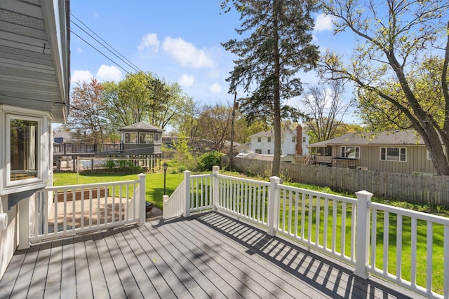 wooden terrace featuring a residential view