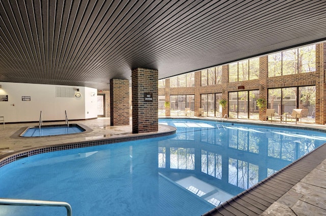 1235 Yale Pl Unit 1706, Minneapolis, MN 55403 - community pool featuring a patio and an indoor hot tub