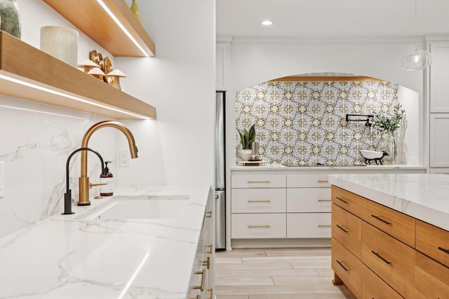 215 Barry Ave S Unit 116And 114, Wayzata, MN 55391 - kitchen featuring open shelves, a sink, backsplash, white cabinets, and recessed lighting