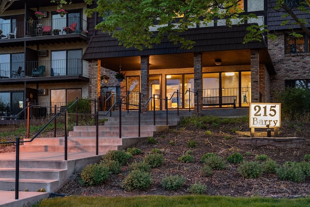 215 Barry Ave S Unit 116And 114, Wayzata, MN 55391 - doorway to property featuring mansard roof