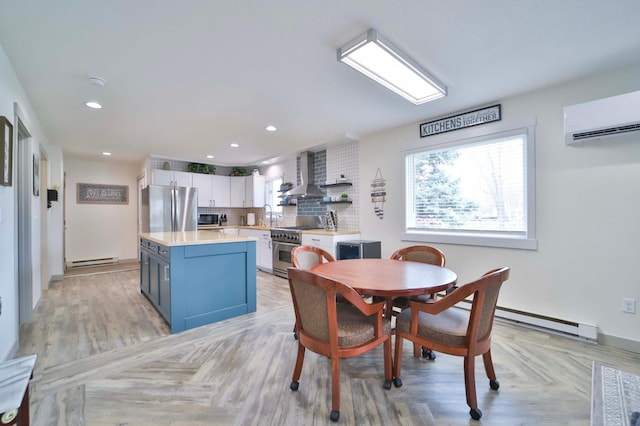 dining area featuring baseboards, a wall unit AC, a baseboard heating unit, and recessed lighting