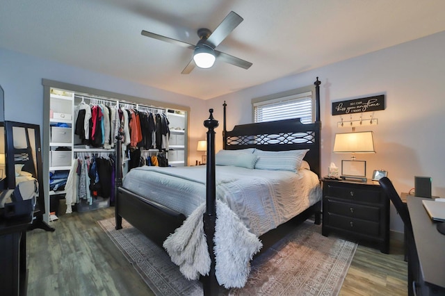 bedroom featuring a closet, ceiling fan, and wood finished floors
