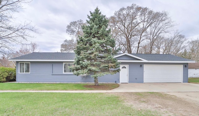 single story home featuring an attached garage, concrete driveway, and a front yard