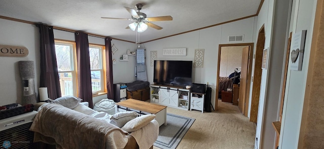 living room with carpet, visible vents, ornamental molding, and lofted ceiling
