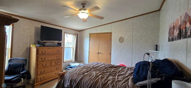 bedroom featuring crown molding, ceiling fan, light carpet, wallpapered walls, and lofted ceiling