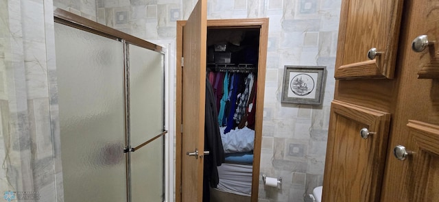 full bathroom with a stall shower