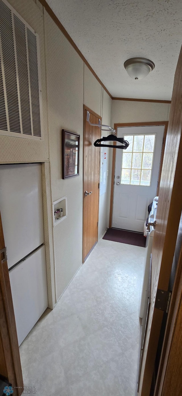 24744 Mound Rd, Dane Prairie Twp, MN 56537 - hallway with ornamental molding and a textured ceiling