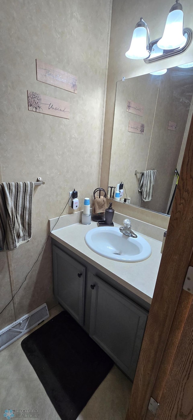 24744 Mound Rd, Dane Prairie Twp, MN 56537 - bathroom with vanity and tile patterned flooring