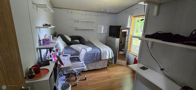 24744 Mound Rd, Dane Prairie Twp, MN 56537 - bedroom with wood finished floors