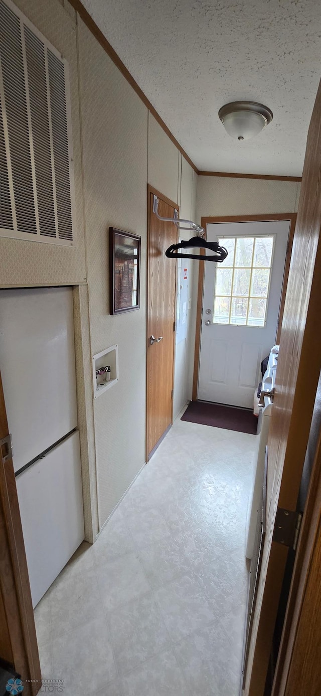 24744 Mound Rd, Dane Prairie Twp, MN 56537 - corridor featuring ornamental molding and a textured ceiling