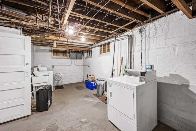 unfinished basement with independent washer and dryer