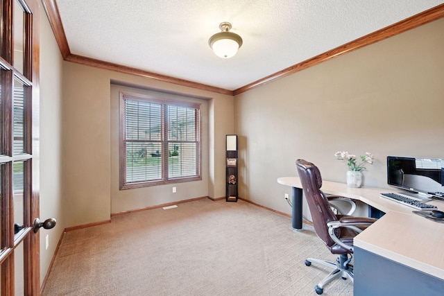 office area with crown molding, a textured ceiling, baseboards, and light colored carpet