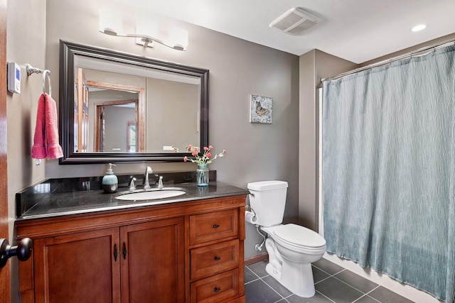 full bath with tile patterned flooring, vanity, toilet, curtained shower, and visible vents