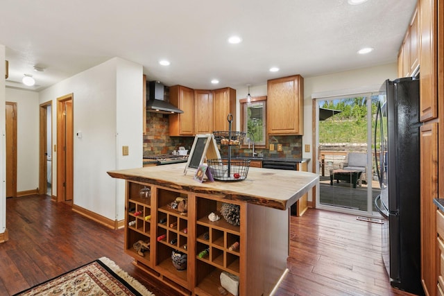 20170 Dunbar Ave, Farmington, MN 55024 - kitchen with wood counters, wall chimney range hood, freestanding refrigerator, decorative backsplash, and a kitchen island