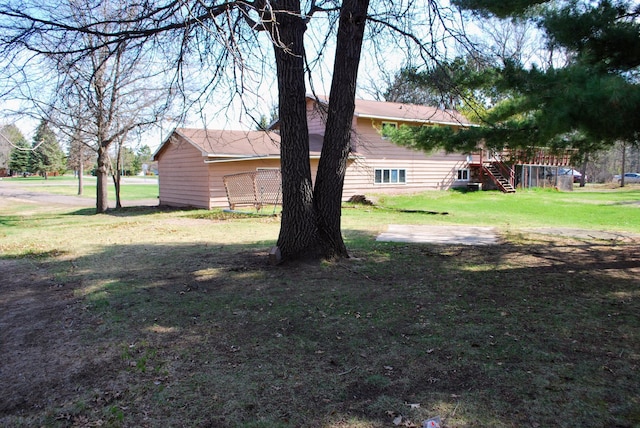 view of yard featuring stairs