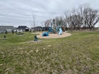 view of community featuring a lawn and playground community