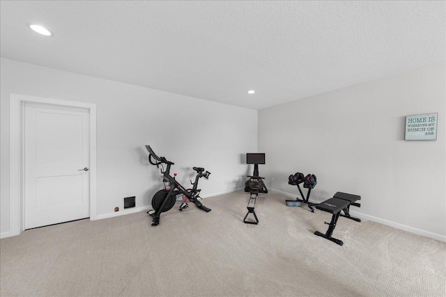 workout area with carpet floors, recessed lighting, and baseboards