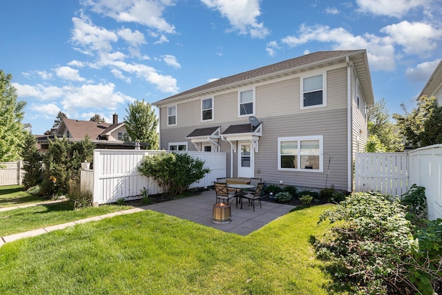 rear view of property featuring a patio