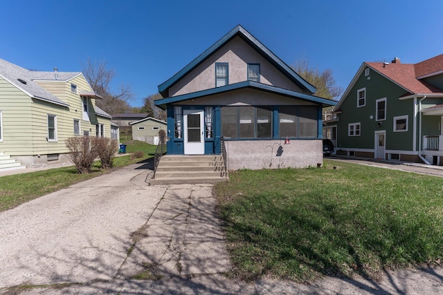 312 Vine St, Fergus Falls, MN 56537 - view of front of property with entry steps and a front lawn