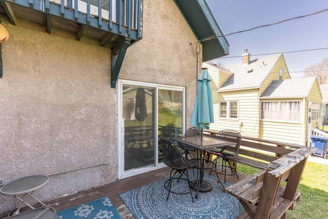 312 Vine St, Fergus Falls, MN 56537 - wooden terrace featuring outdoor dining space
