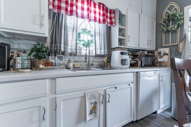 312 Vine St, Fergus Falls, MN 56537 - kitchen featuring white dishwasher, a sink, white cabinetry, open shelves, and light countertops
