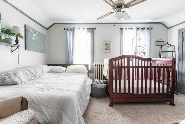 312 Vine St, Fergus Falls, MN 56537 - bedroom featuring crown molding, lofted ceiling, carpet flooring, and ceiling fan