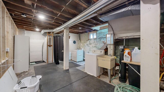 621 Fillmore St SE, Chatfield, MN 55923 - below grade area with separate washer and dryer and a sink