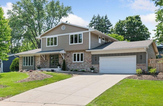 7000 Lanham Ln, Edina, MN 55439 - view of front of house with a garage, brick siding, concrete driveway, and board and batten siding