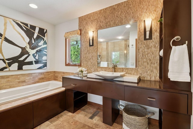7000 Lanham Ln, Edina, MN 55439 - full bathroom featuring a sink, a bath, and a shower