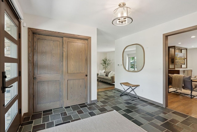 7000 Lanham Ln, Edina, MN 55439 - foyer entrance with a chandelier and recessed lighting