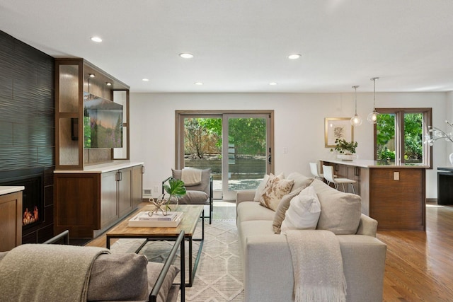 7000 Lanham Ln, Edina, MN 55439 - living area featuring healthy amount of natural light, light wood-style flooring, and recessed lighting